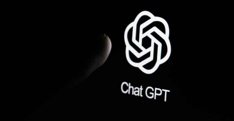 Human finger touching the Chat GPT logo